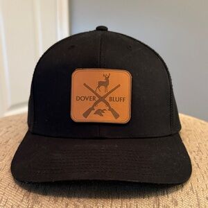 Black Dover Bluff trucker hat.